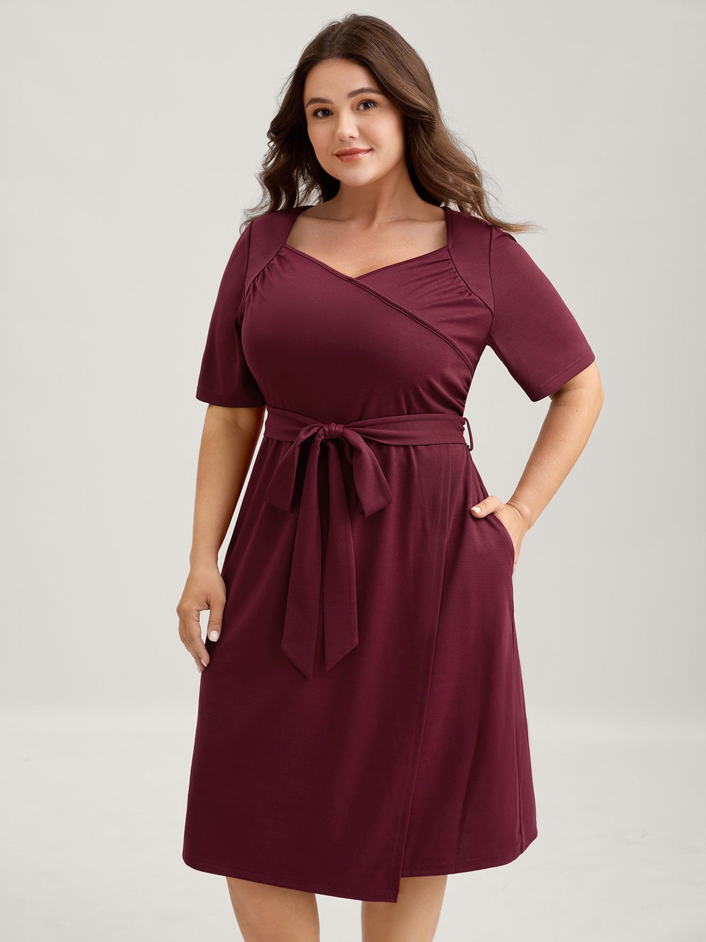 Stretchy Overlap Bodice Pockets Knit Midi Dress